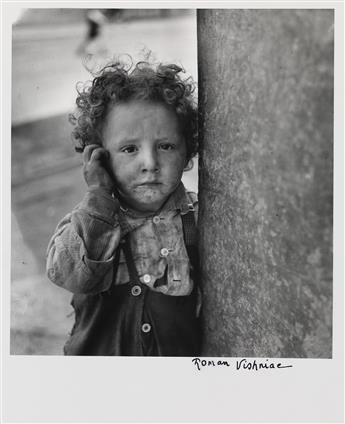 ROMAN VISHNIAC (1897-1990) A group of 9 street photographs, both larger scenes and portraits, depicting Jewish life in Poland.